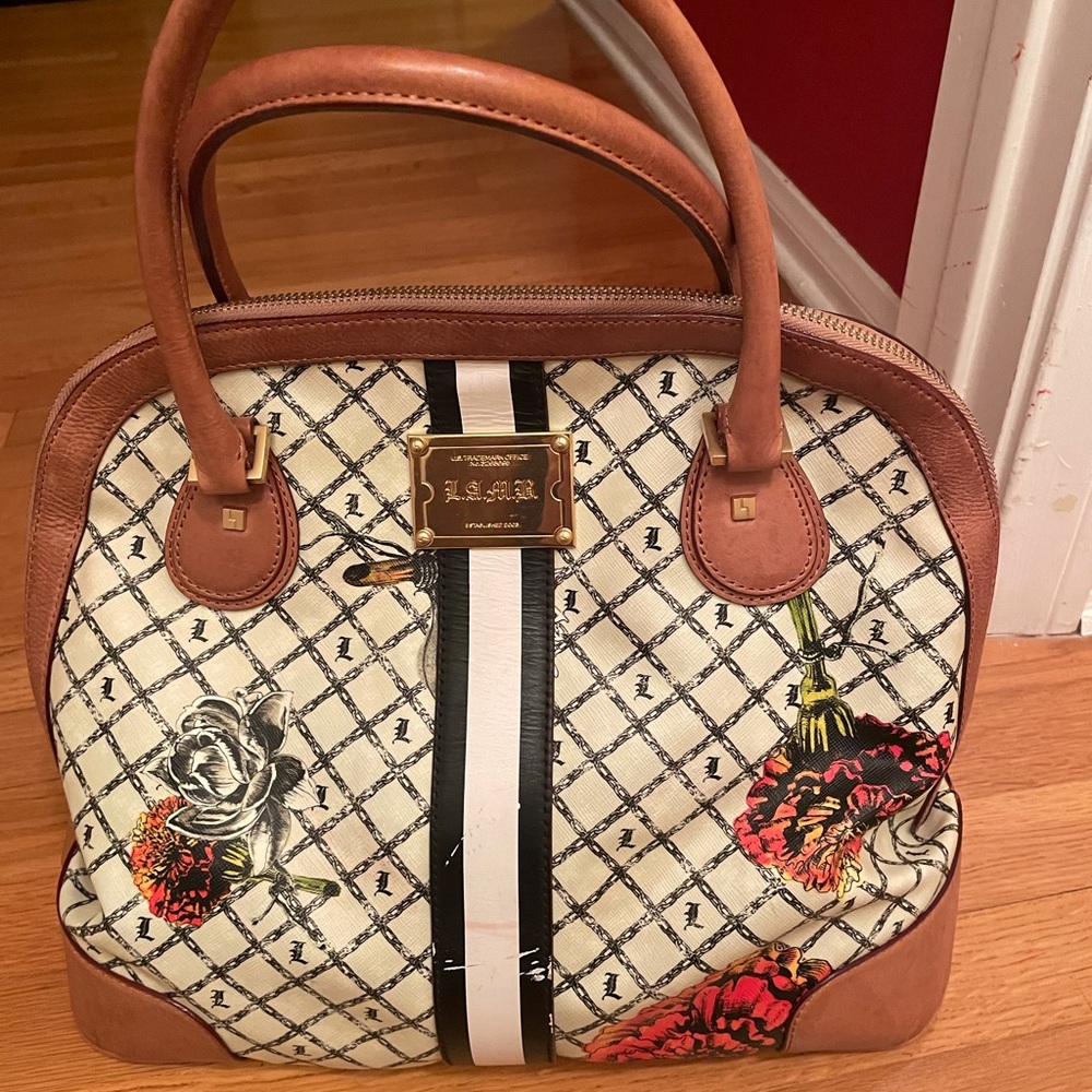 LAMB Large tote bag with gold hardware.